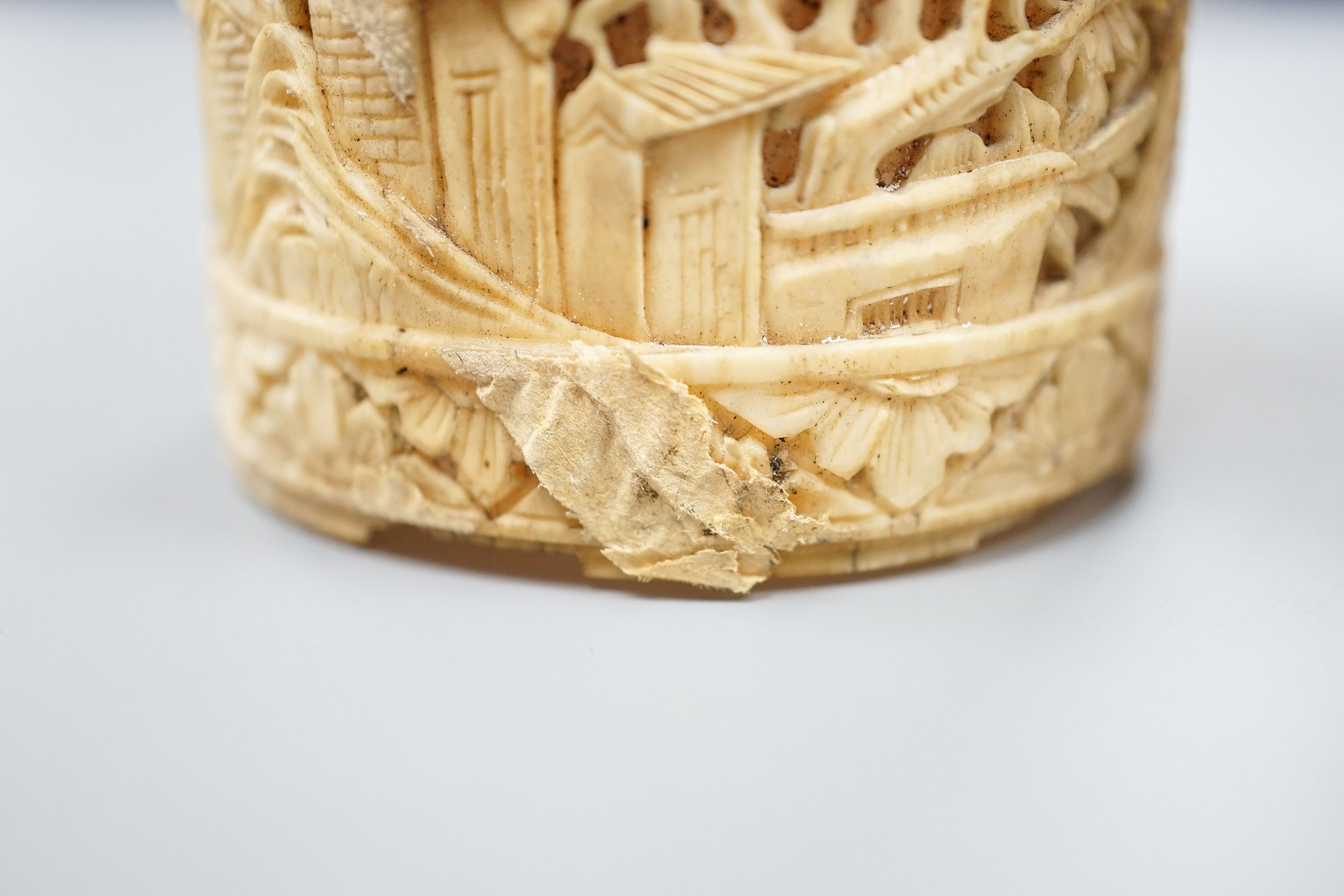 A pair of Chinese carved ivory pots and a Chinese ivory circular box and cover, 19th century